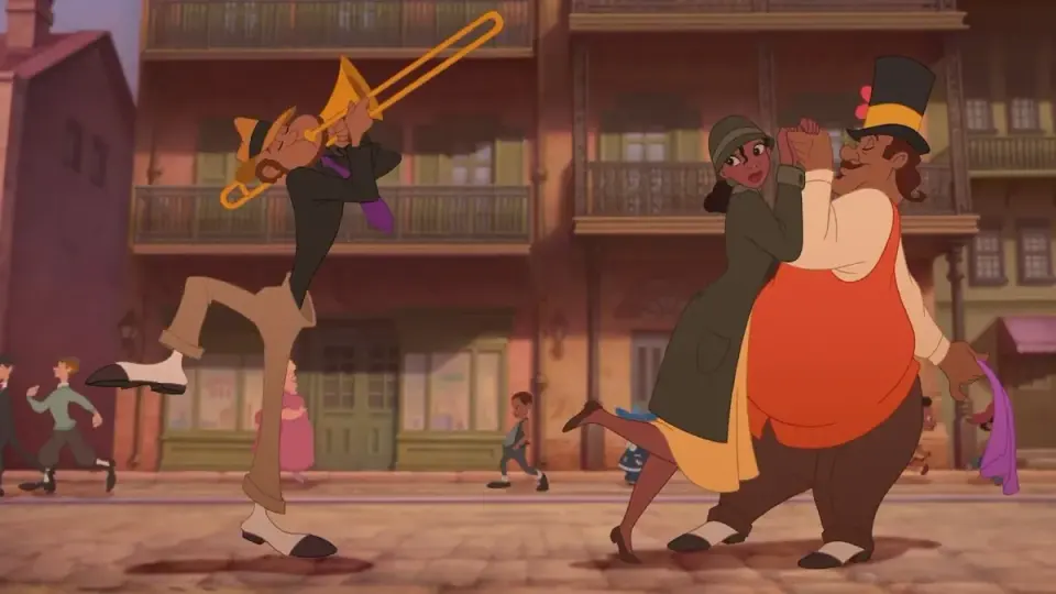 Animated New Orleans scene of a couple dancing beside a trombone player on a cobblestone street